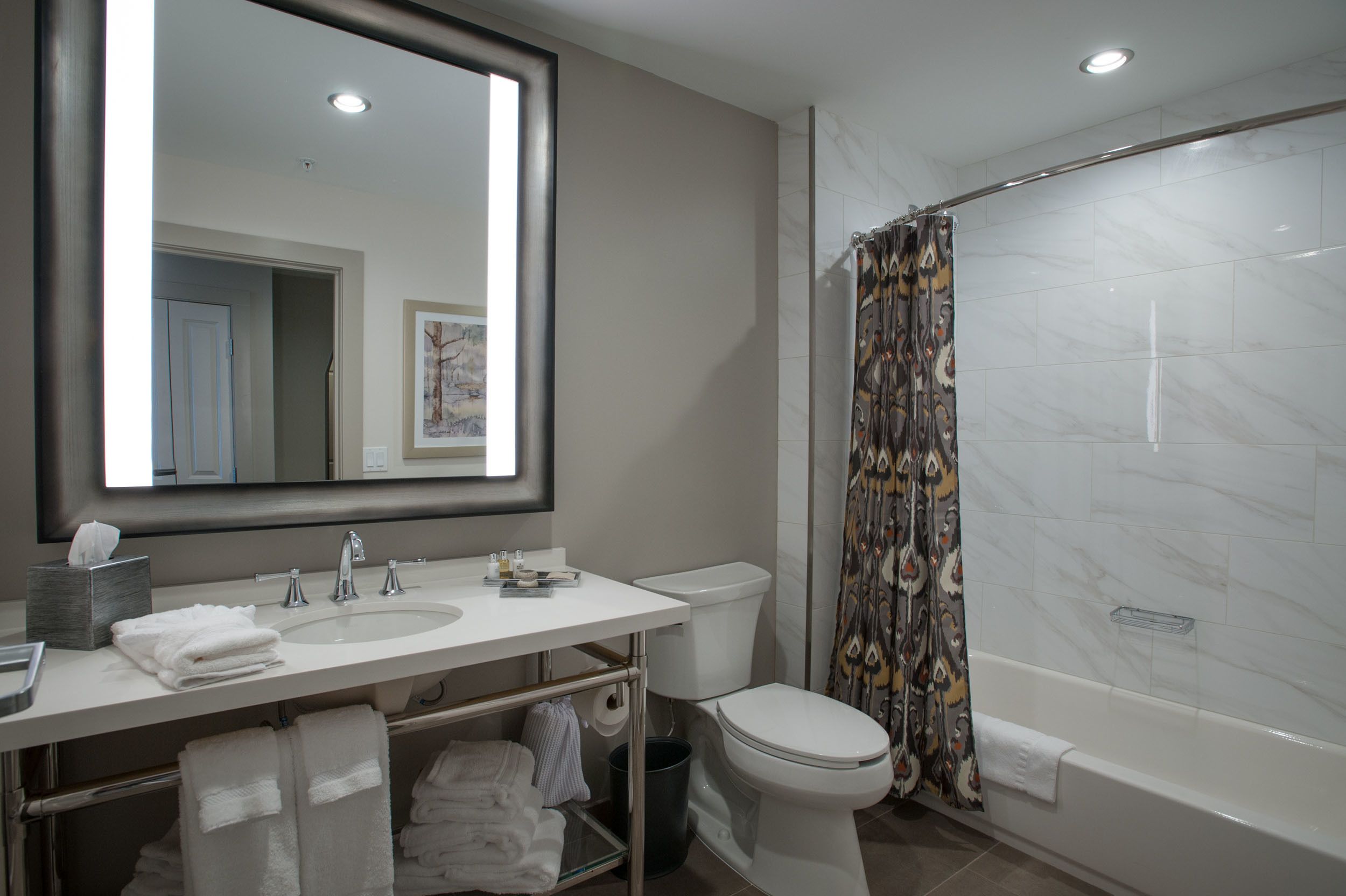 deluxe room, 2 queen beds | bathroom | free toiletries, hair dryer, towels