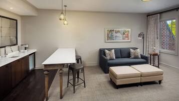 Studio Suite, 1 King Bed with Sofa bed | Living area | Flat-screen TV