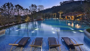 Outdoor pool, pool umbrellas, pool loungers