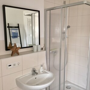 Bruser, hårtørrer, badekåber, hjemmesko