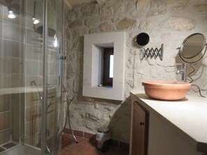 Shower, hair dryer, towels, toilet paper