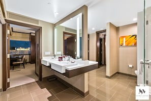 Bathtub, hair dryer, towels, soap