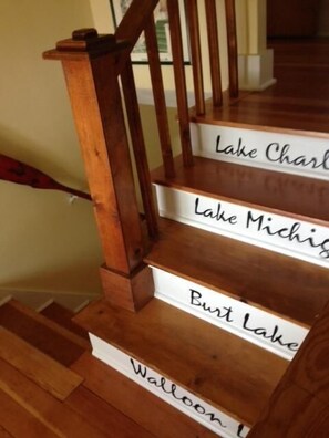 A wooden staircase with steps labeled with names of lakes. -
VENETIAN'27SEND INQUIRY! Walk to Everything/Fenced Yard/Enclosed Front Porch/AC (Charlevoix)