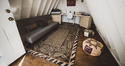 Tiny A-Frame and 6 acres for camping up in the mountains.