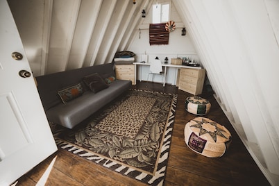 Tiny A-Frame and 6 acres for camping up in the mountains.