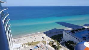 On the beach, sun loungers, beach towels