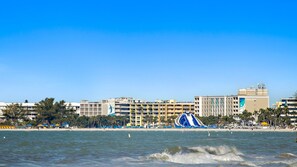 On the beach, sun-loungers, beach towels