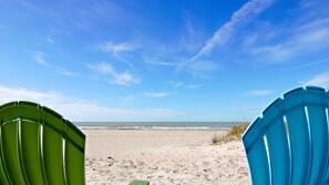 On the beach, sun loungers, beach towels