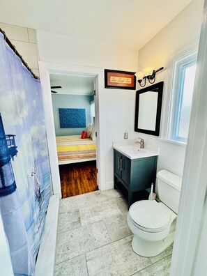 Shower, hair dryer, towels, soap