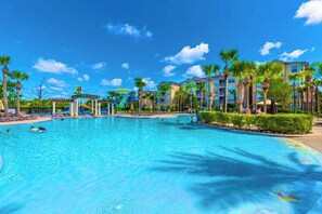 A large swimming pool surrounded by palm trees and a gazebo. - Welcome to The Windsor Magic with Professional Arcade Room! Brand New 2024! (Kissimmee)