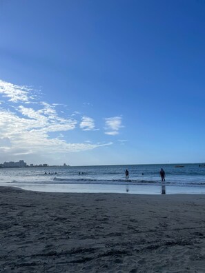 On the beach, sun-loungers, beach towels