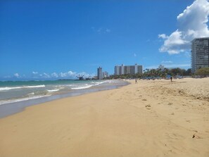 On the beach, sun loungers, beach towels