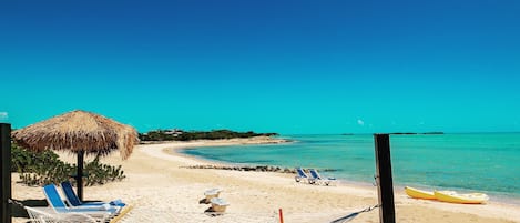 On the beach, sun loungers, beach towels