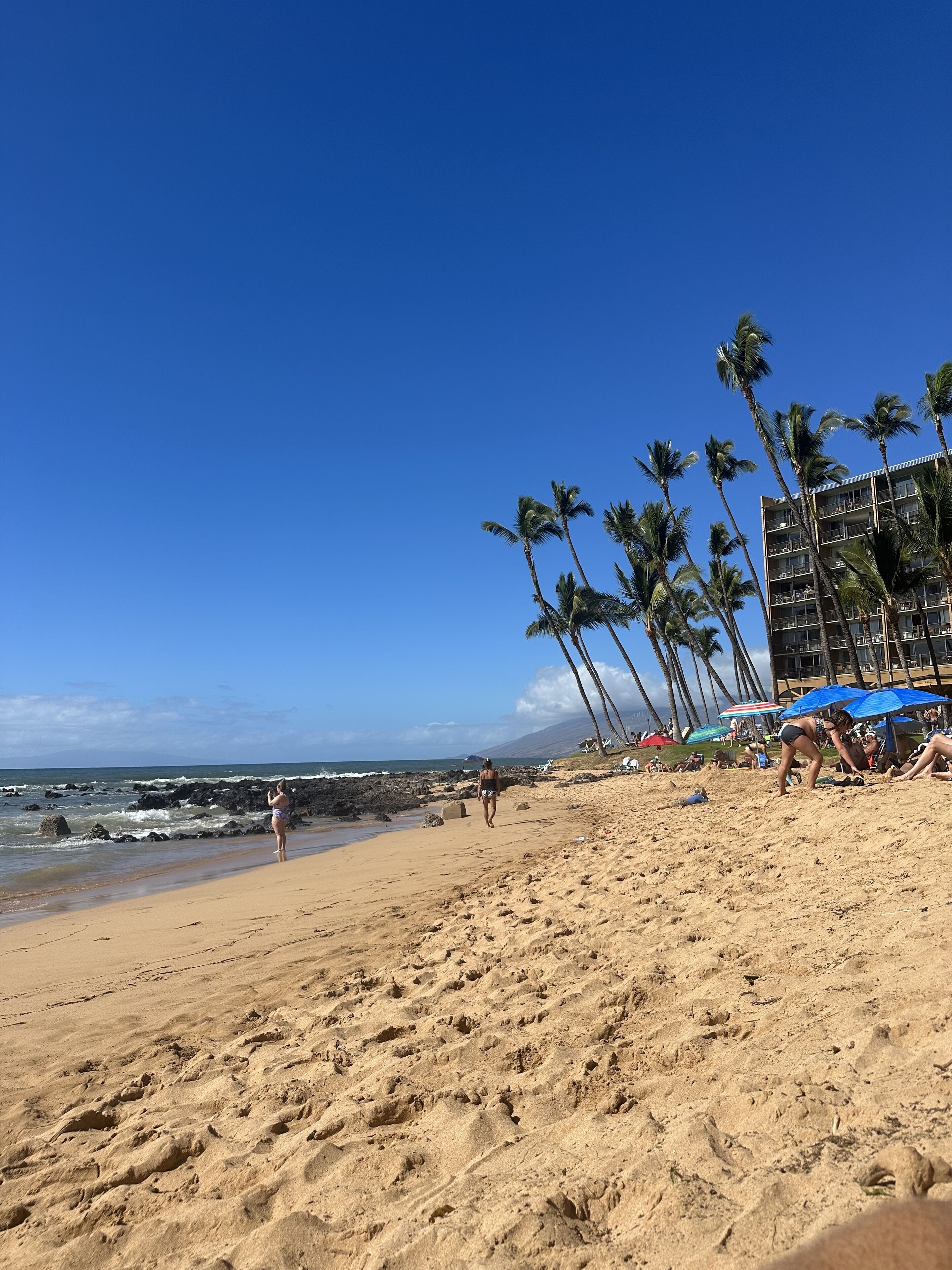 On the beach, sun-loungers, beach towels