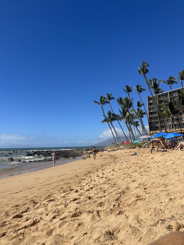 On the beach, sun loungers, beach towels