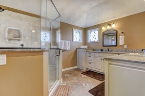 Combined shower/tub, hair dryer, towels, soap