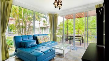 2-Bedroom Bungalow | Living area | 32-inch flat-screen TV with satellite channels, TV