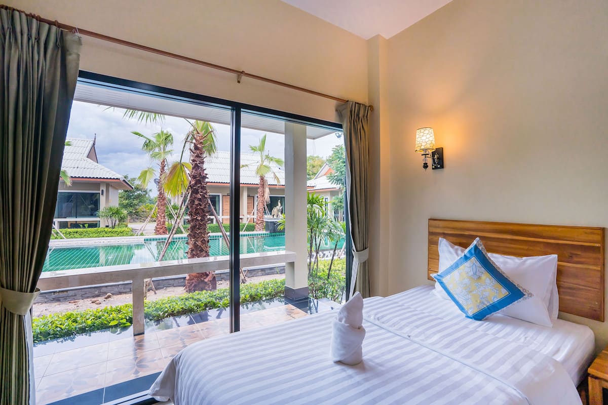 Superior Double or Twin Room, Pool View | Desk, laptop workspace, blackout drapes, iron/ironing board