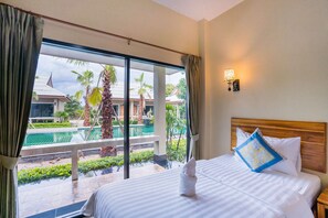 Superior Double or Twin Room, Pool View | Desk, laptop workspace, blackout drapes, iron/ironing board - Tontan Resort Cha-Am (Tha Yang)