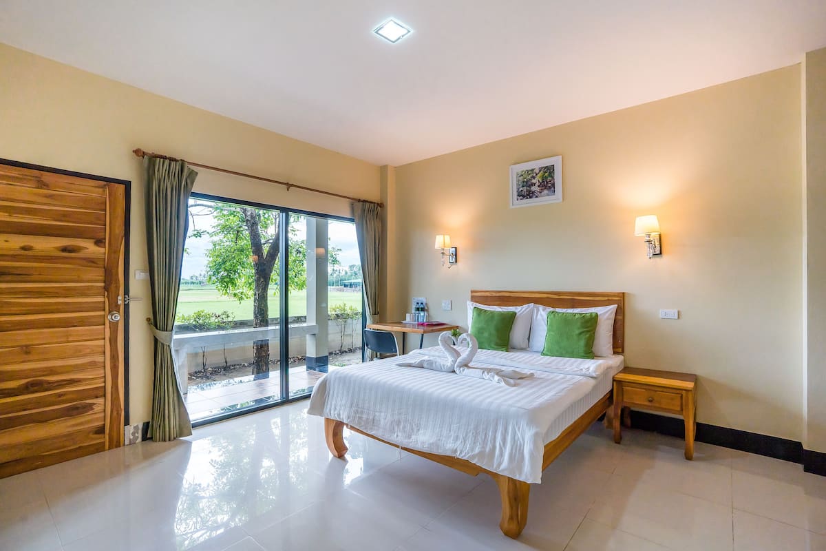 Deluxe Double Room | Desk, laptop workspace, blackout drapes, iron/ironing board