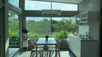 Villa | Private kitchen | Full-size fridge, microwave, stovetop, electric kettle