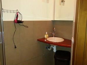 Hair dryer, towels, soap, shampoo