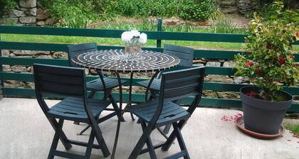 Terraced house in stone, near a river. peaceful
