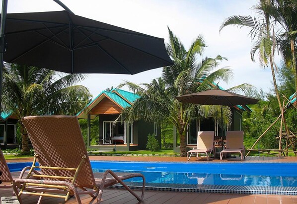 Outdoor pool, pool umbrellas, pool loungers