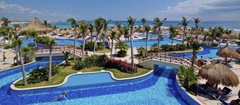 My Eco Chic 2bdr  Sanctuary with beach, pools, & golf club !