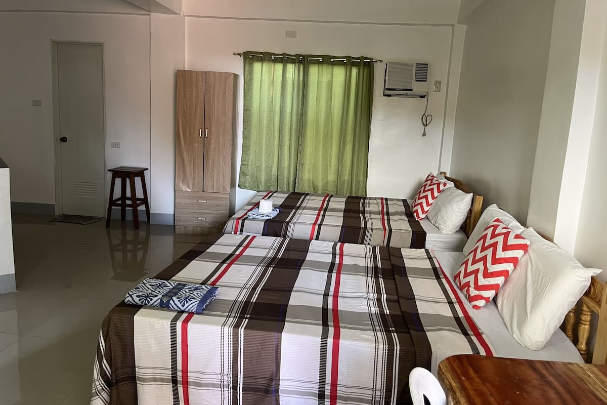 Family Room, 2 Bedrooms, Balcony, Poolside | Desk, free WiFi