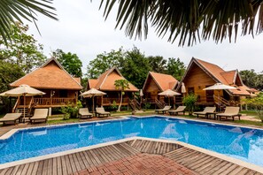 Deluxe Triple Room, Multiple Beds, Balcony, Poolside | Free minibar items, in-room safe, desk, soundproofing - Angkor Heart Village (Siem Reap)