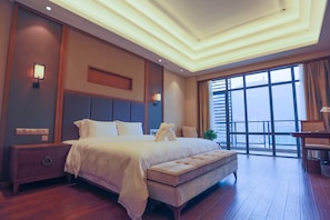 Minibar, desk, blackout curtains, iron/ironing board