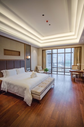 Minibar, desk, blackout curtains, iron/ironing board
