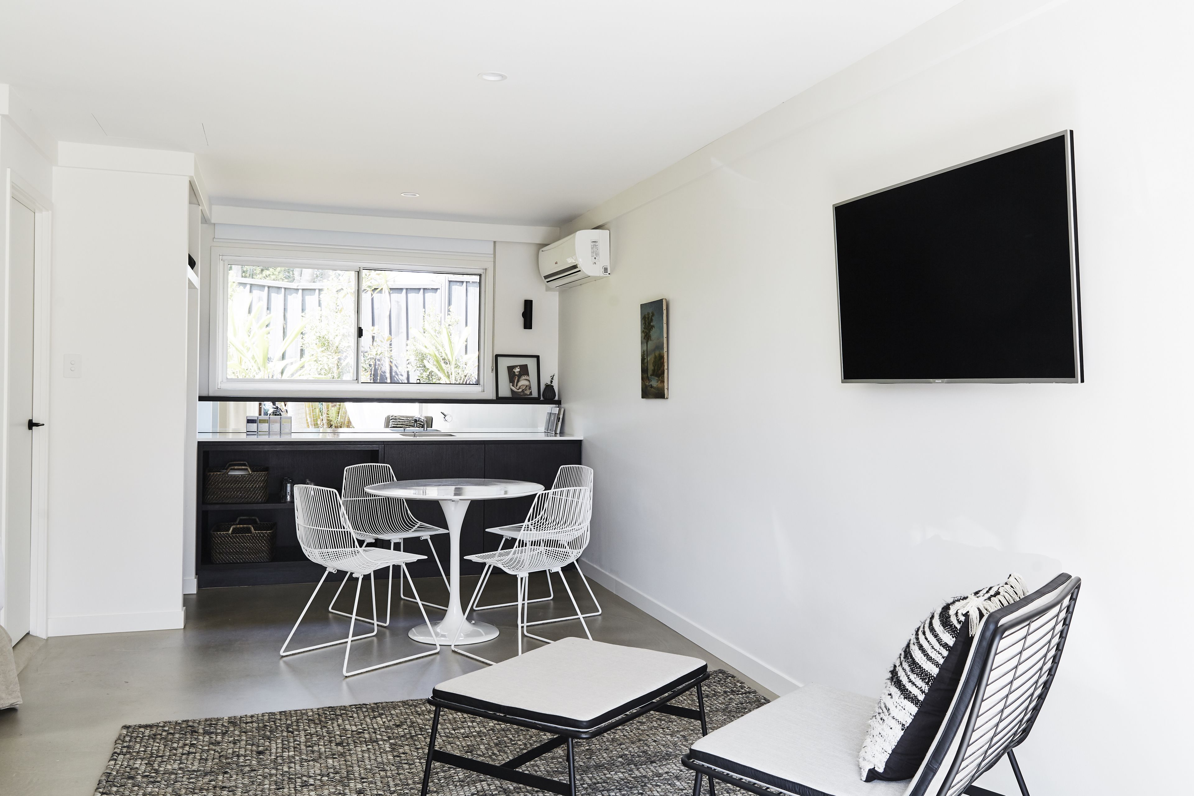 signature triple room, multiple beds | living area | 50-inch flat-screen tv with digital channels