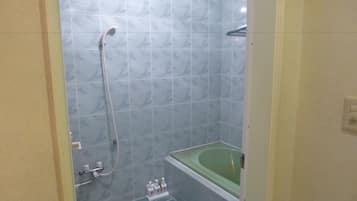 Economy Double Room | Bathroom | Separate bathtub and shower, deep-soaking bathtub, free toiletries
