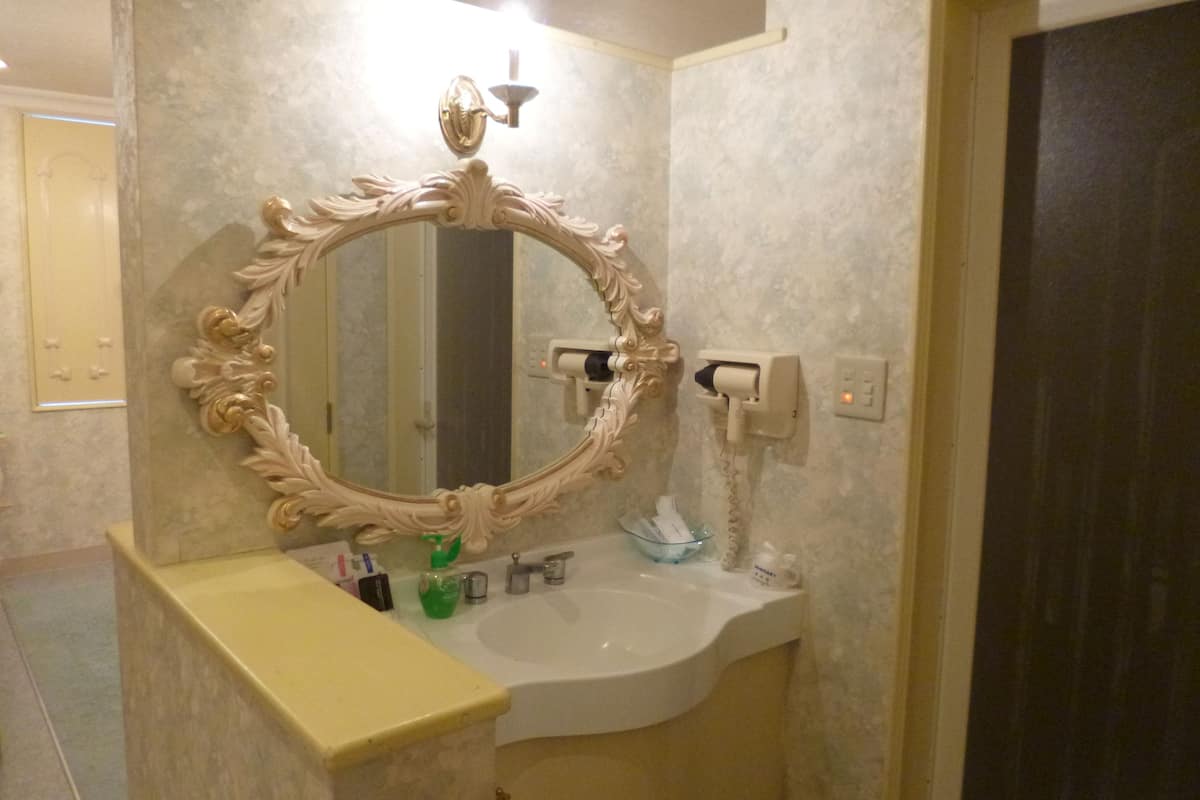 twin room with sofa bed | bathroom sink