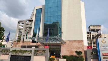 A modern building with a glass facade, a prominent 'FORTUNE PARK BBD' sign, and a 'Member ITC's hotel group' sign.