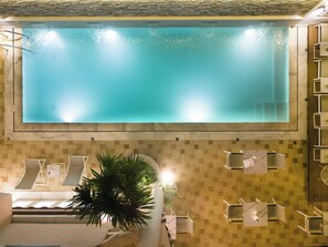 Outdoor pool, pool umbrellas, sun loungers