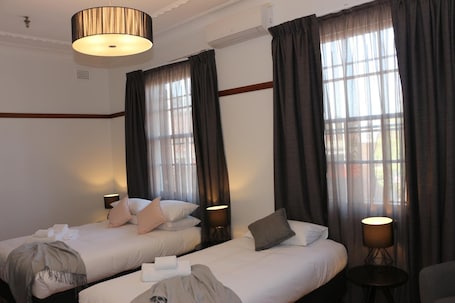 Desk, blackout curtains, free WiFi, bed sheets. Guildford Hotel
