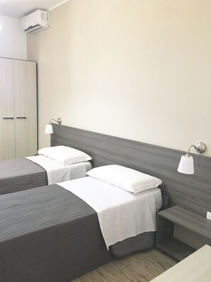 Roba de llit d'alta qualitat, minibar i caixa forta a l'habitació 