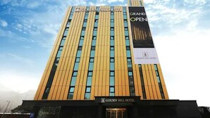 The exterior of the Golden Hill Hotel with a prominent sign indicating it is open. - Paju Golden Hill (Paju)