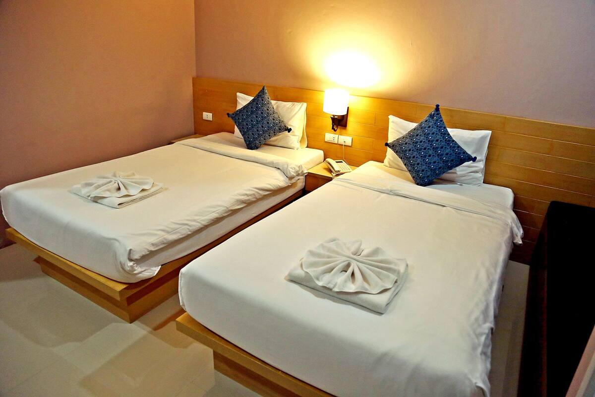 Standard Twin Room, 2 Twin Beds | In-room safe, WiFi (free), bed sheets