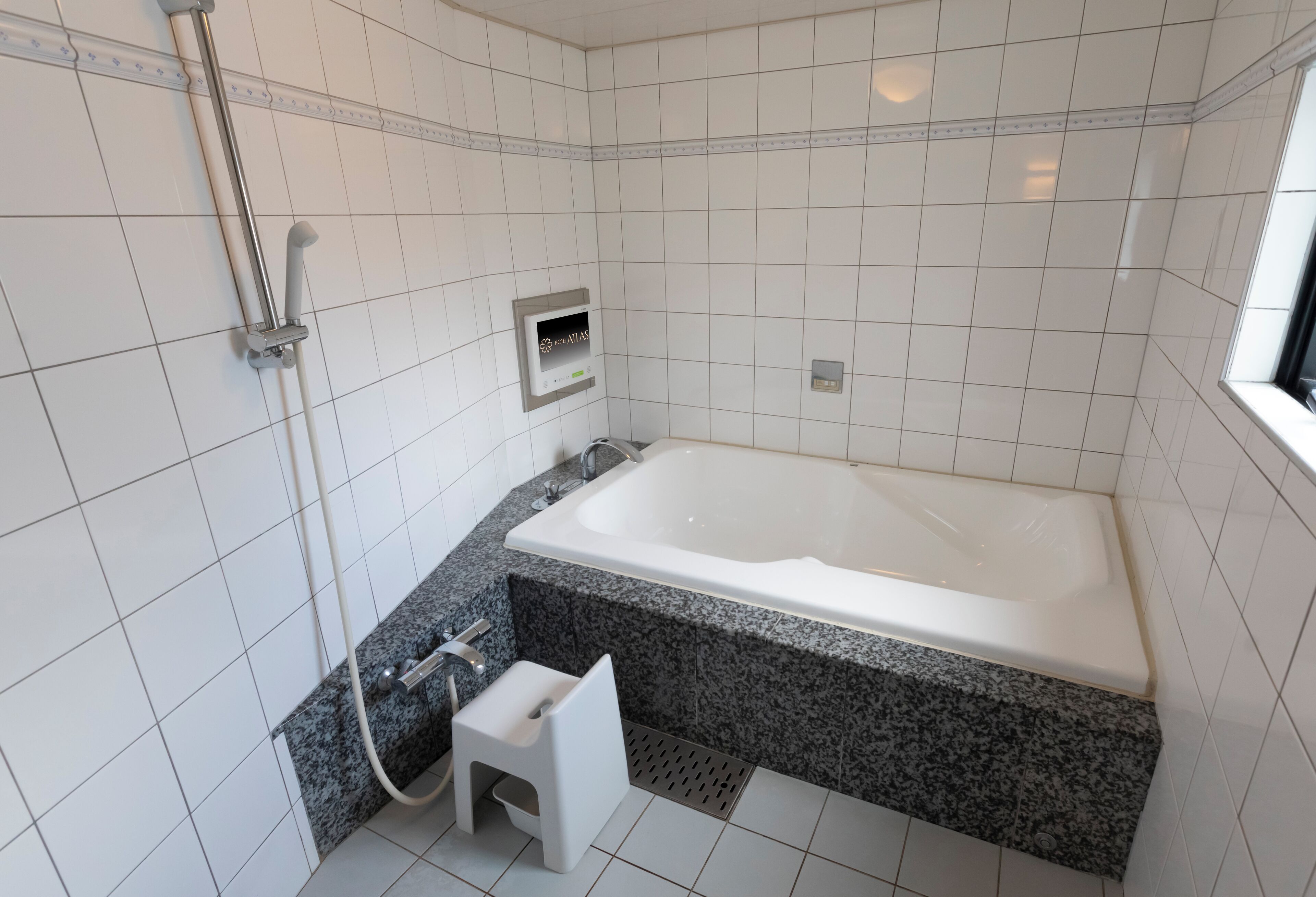 Separate bathtub and shower, free toiletries, hair dryer, bathrobes
