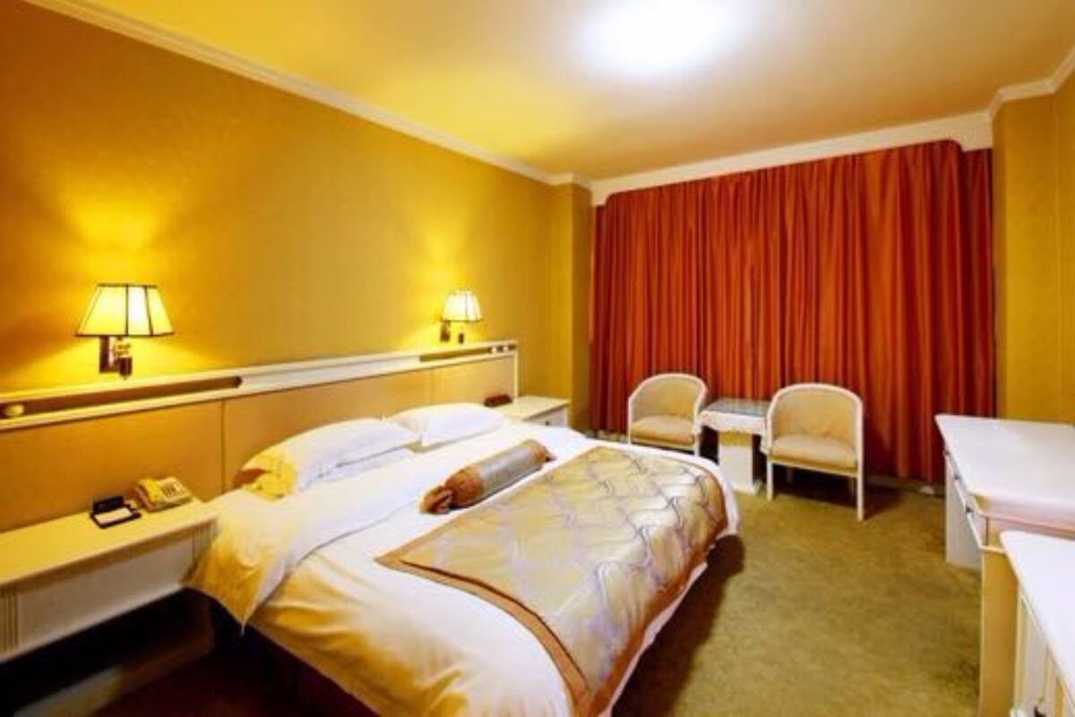 Minibar, desk, blackout curtains, iron/ironing board