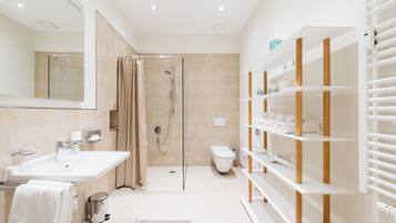 Rainfall showerhead, eco-friendly toiletries, hair dryer, towels