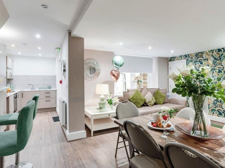 Deluxe Apartment, 3 Bedrooms | Living area | Flat-screen TV
