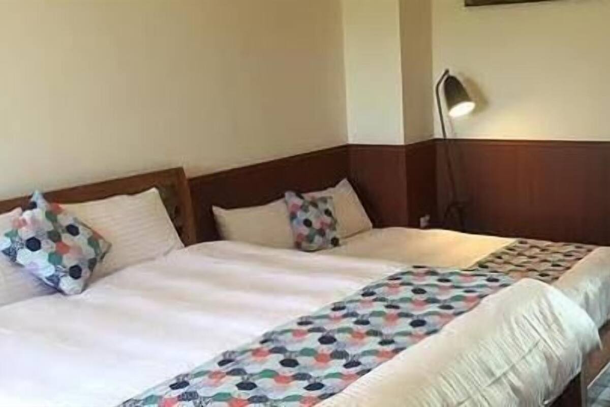 Standard Quadruple Room, Mountain View | Blackout curtains, free WiFi, bed sheets