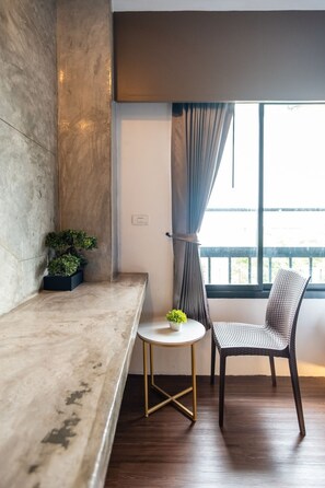 Deluxe driepersoonskamer | Uitzicht vanuit de kamer