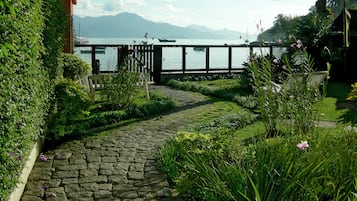 Suite, Sea View | Garden view