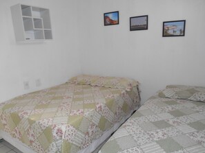 Appartement Familial, 2 chambres, réfrigérateur et four à micro-ondes, en bord de piscine | Literie de qualité supérieure, minibar, rideaux occultants